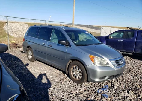2010 Honda Odyssey Exl z USA, uszkodzony, nr VIN 5FNRL3H60AB042292